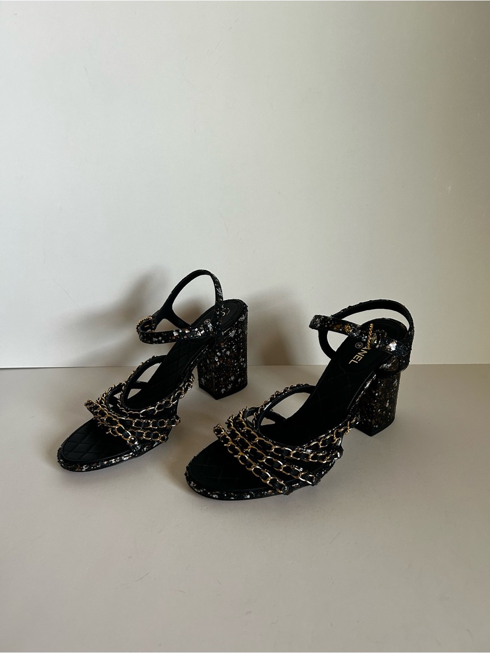 CHANEL Black Quilted Leather Block Heel Sandals with Gold Chain